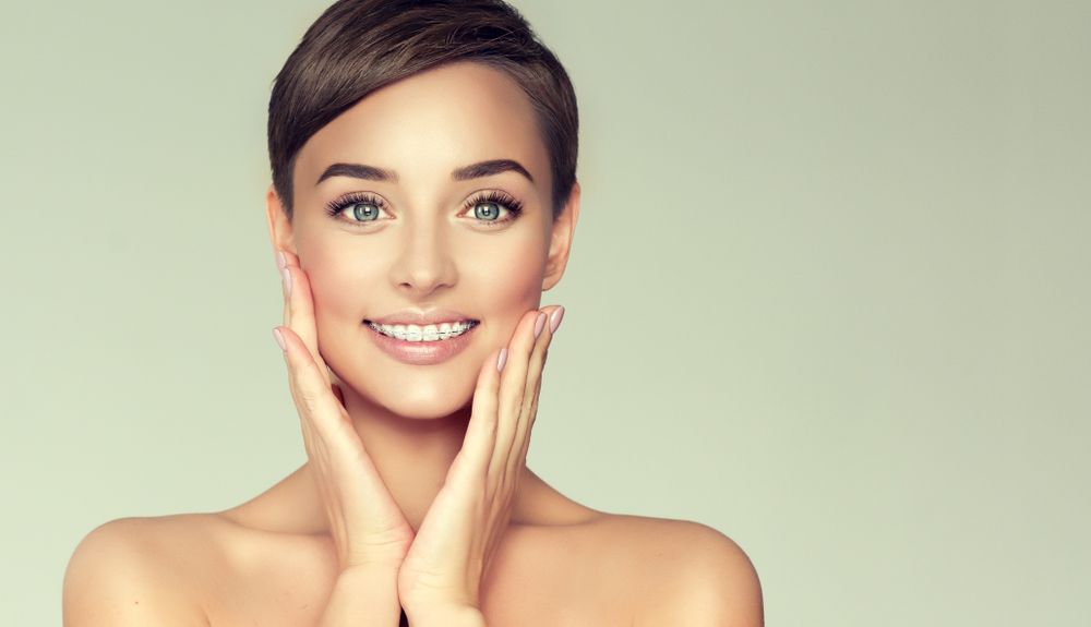 Nguyên nhân gây hóp má sau khi niềng răng