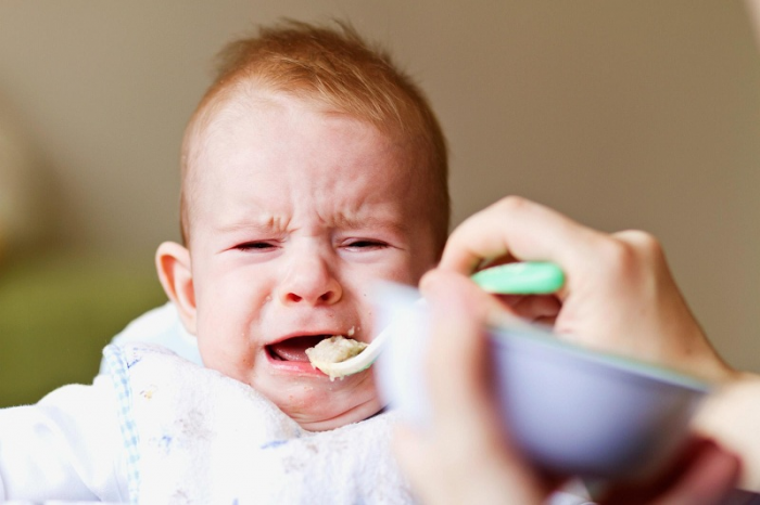 Làm gì khi bé 9 tháng nôn trớ, chậm tăng cân?